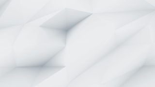Abstract geometric background with subtle white and light gray triangular facets, creating a three-dimensional, textured appearance. The overall tone is soft and minimalist.